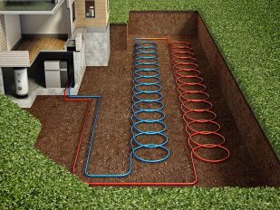 Eine schematische Darstellung eines Hauses mit einem Geothermie-System. Das Bild zeigt, wie Rohre unterirdisch verlegt sind, um Wärme aus dem Boden zu gewinnen. Die Rohre sind in Schleifen angeordnet, wobei blaue und rote Linien die Zirkulation von kaltem und warmem Wasser symbolisieren. Dieses System ist in einem Gartenbereich neben dem Haus installiert und veranschaulicht die Funktionsweise einer oberflächennahen Geothermie-Anlage.